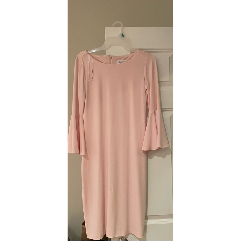 Light pink Calvin Klein cocktail dress with bell sleeves